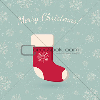 Christmas sock on winter backdrop.