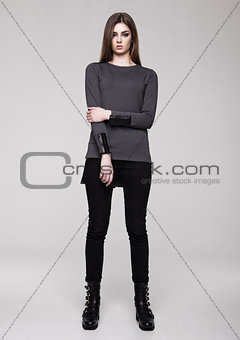 Beautiful young girl wearing shirt fashion on grey