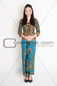 Southeast Asian girl in batik dress 
