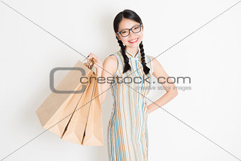 Oriental female shopping