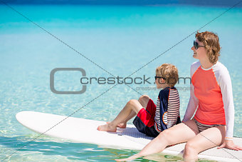 family stand up paddling