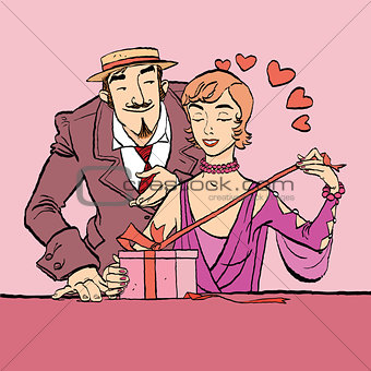Love and romance. Retro woman opens the gift