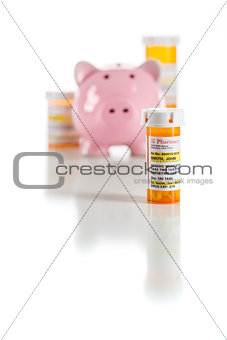 Piggy Bank and Non-Proprietary Medicine Prescription Bottles Iso