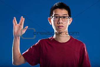 nerd trekkie salutation by an asian guy