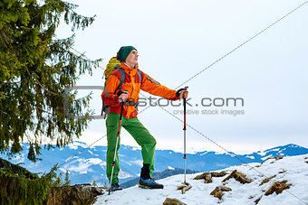 hiker in the winter mountains