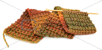 Knitting a scarf in fall colors