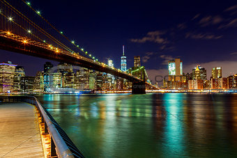 Brooklyn Bridge over East River night in New York City
