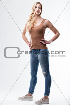 blue jeans and brown underskirt woman