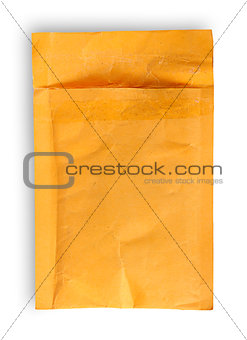 Open used yellow envelope top view