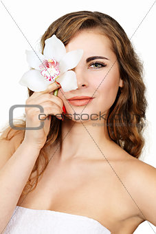 woman holding orchid flower
