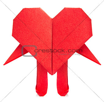 Red heart of origami with arm and leg.