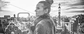 elegant tourist woman in Barcelona, Spain looking aside