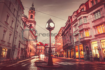 Czech Republic Prague square with old street lamp with clock