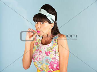 Woman puffing on a weed joint