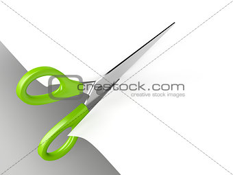 Cutting paper with scissors 