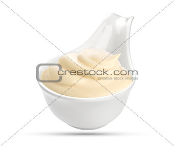 Mayonnaise sauce in bowl isolated on white