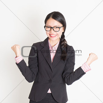 Businesswoman celebrating success