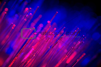defocused abstract background of fiber optic cables