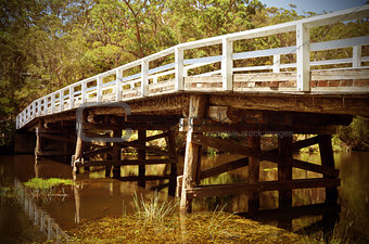 Rustic vintage white wooden bridge
