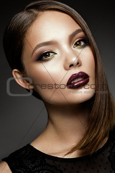 Beautiful girl with bright make up