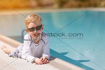 kid by the pool