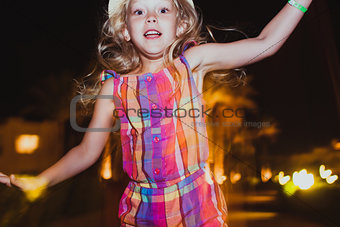 Little girl jumping and having fun.