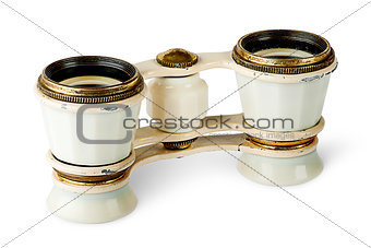 Old vintage pair of opera glasses vertically flipped