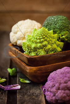 Fresh organic white and purple cauliflower, broccoli, romanesco