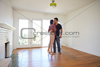 Romantic Couple In New Home On Moving Day