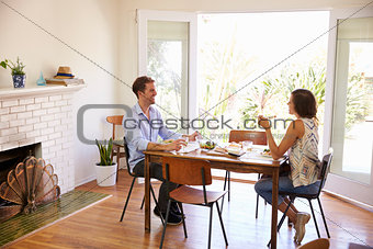 Couple Enjoying Meal At Home Together