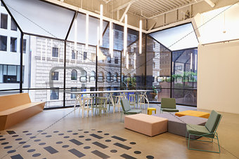 Modern windows and furniture in corporate business cafeteria