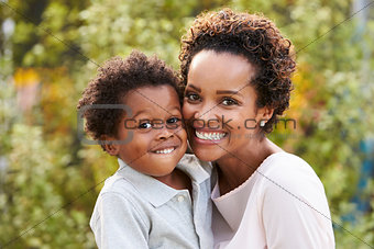 Portrait of young African American mother with toddler son