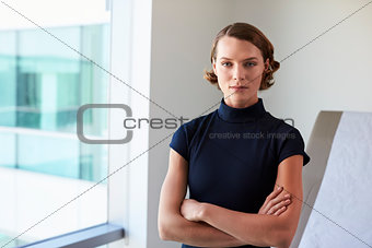 Portrait Of Female Doctor In Exam Room