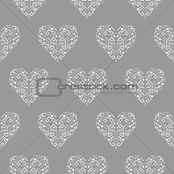 Tribal heart shape ornament seamless vector pattern.