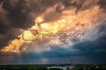 Nuclear power plant with an intense golden and cloudy sky