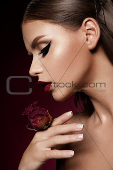 Red Lips and Smoky Eyes Make up. Glamour Lady Portrait.