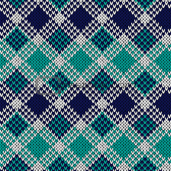 Seamless knitted pattern in blue, turquoise and white colors