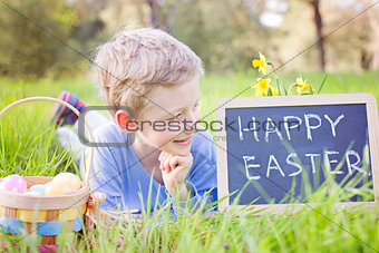 smiling boy with easter eggs