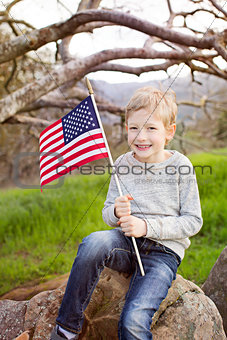 smiling boy with american flag