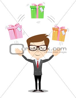 Happy man juggling gift box with bow