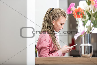woman concentrated in sending messages