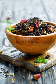 Flavored black tea with flower petals.