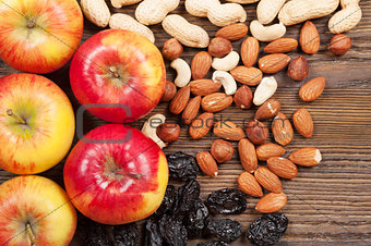 Nuts and red apples