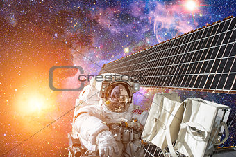 Astronaut in outer space. Spacewalk. Elements of this image furnished by NASA