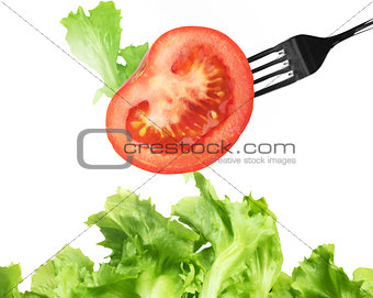 Background of mixed salad with a fork