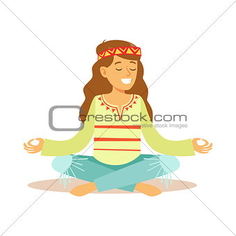 Girl Hippie Dressed In Classic Woodstock Sixties Hippy Subculture Clothes Meditating In Lotus Pose
