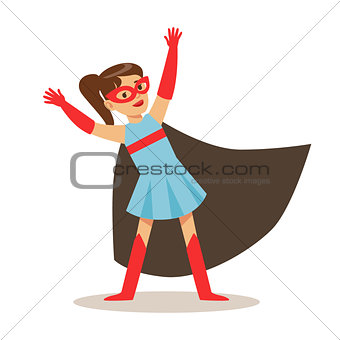 Girl In Blue Dress Pretending To Have Super Powers Dressed In Superhero Costume With Black Cape And Mask Smiling Character