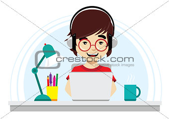 Nerd with round glasses working on laptop