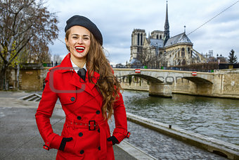 tourist woman on embankment near Notre Dame de Paris