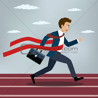 Running businessman crosses a red ribbon.